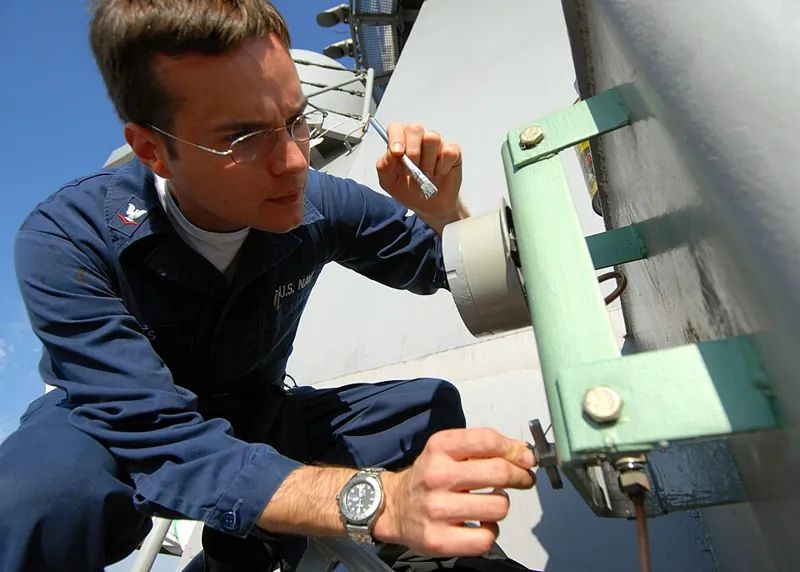 Painting in hot humid weather: brush painting steel on a ship weather deck