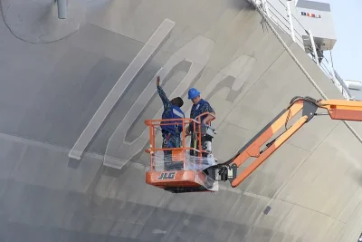 Marine coating DFT inspection on a ship hull during coating work