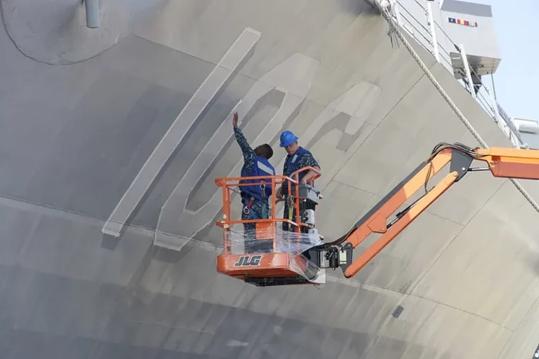 Marine coating DFT inspection on a ship hull during coating work