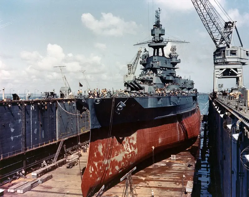 Ship in dry dock showing a worn epoxy and polyurethane coating system before recoating