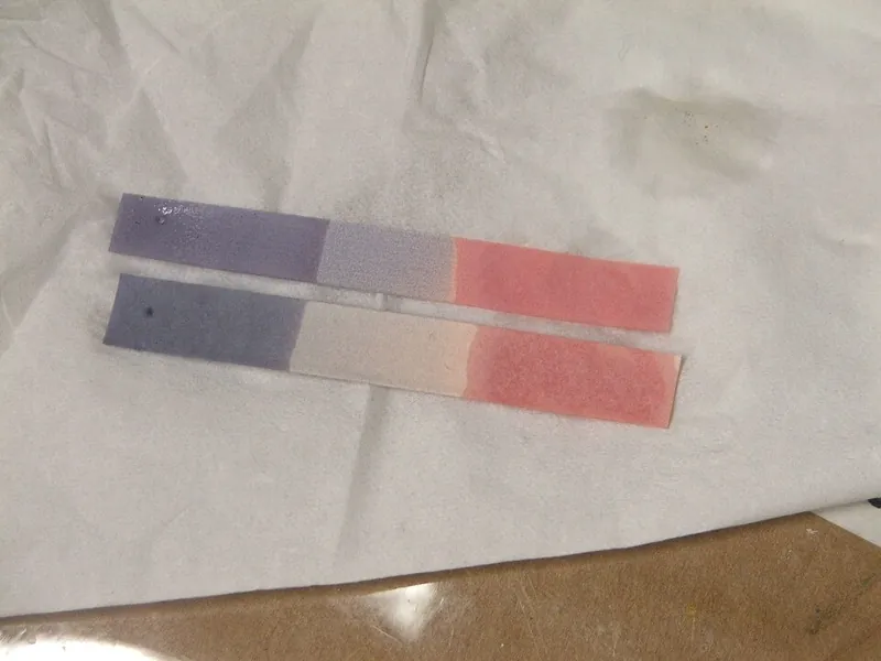 pH test paper used in an amine blush test on epoxy